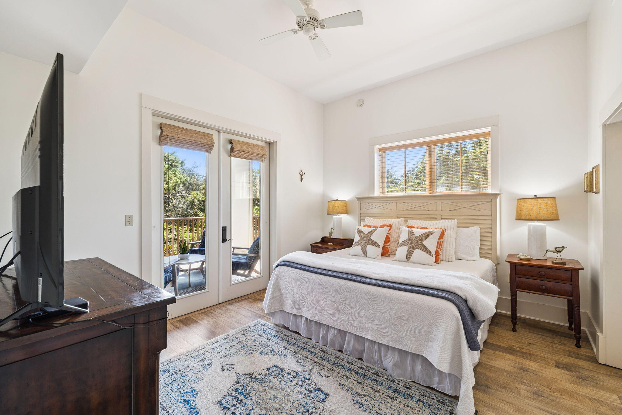 2046 West County Highway 30A, Unit M2230 Santa Rosa Beach, FL 32459 - Photo 12 of 39 a bedroom with a bed and a flat tv screen on a dresser
