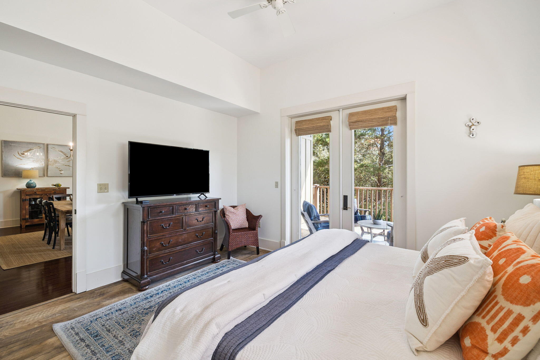 2046 West County Highway 30A, Unit M2230 Santa Rosa Beach, FL 32459 - Photo 13 of 39 a bedroom with a bed and a flat screen tv