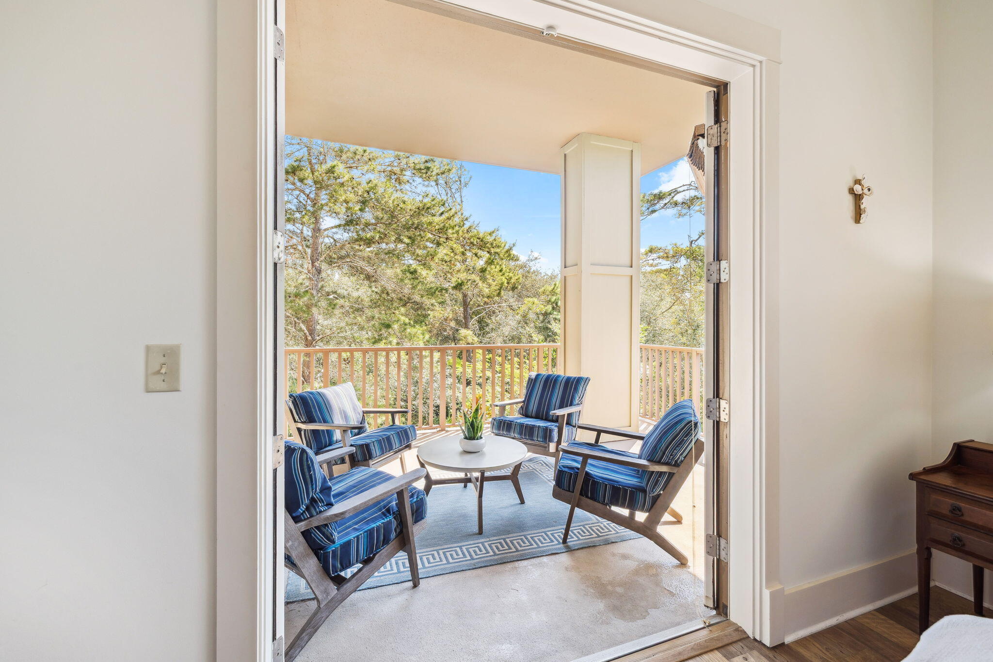 2046 West County Highway 30A, Unit M2230 Santa Rosa Beach, FL 32459 - Photo 16 of 39 a living room with furniture and a floor to ceiling window