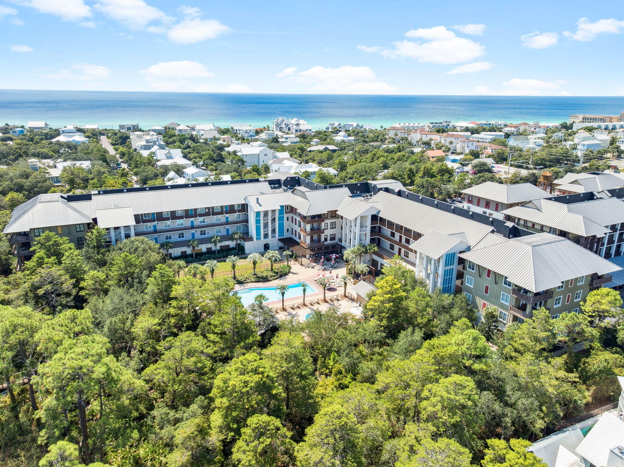 2046 West County Highway 30A, Unit M2230 Santa Rosa Beach, FL 32459 - Photo 27 of 39 an aerial view of a house with a garden