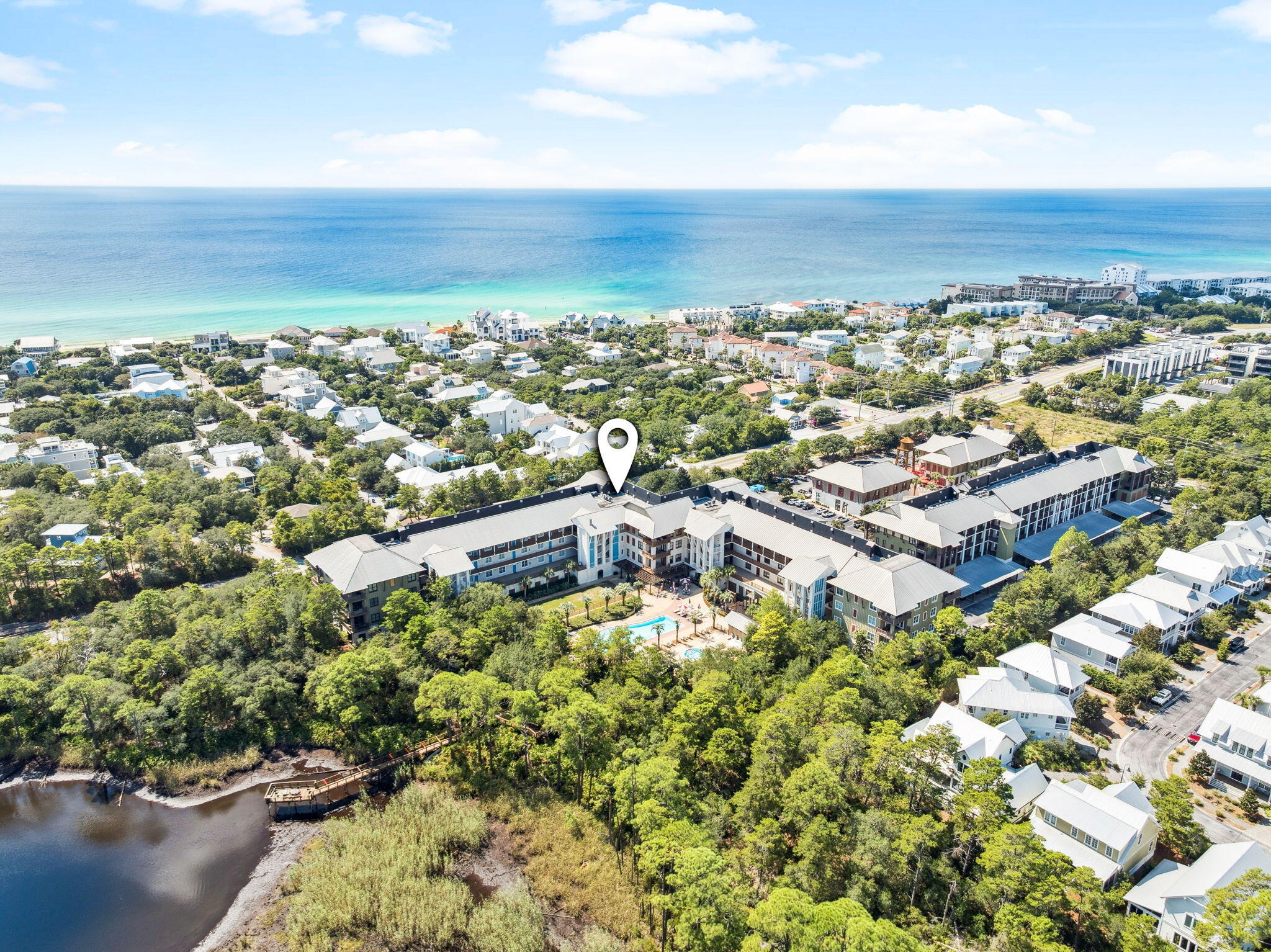 2046 West County Highway 30A, Unit M2230 Santa Rosa Beach, FL 32459 - Photo 28 of 39 an aerial view of residential building with outdoor space