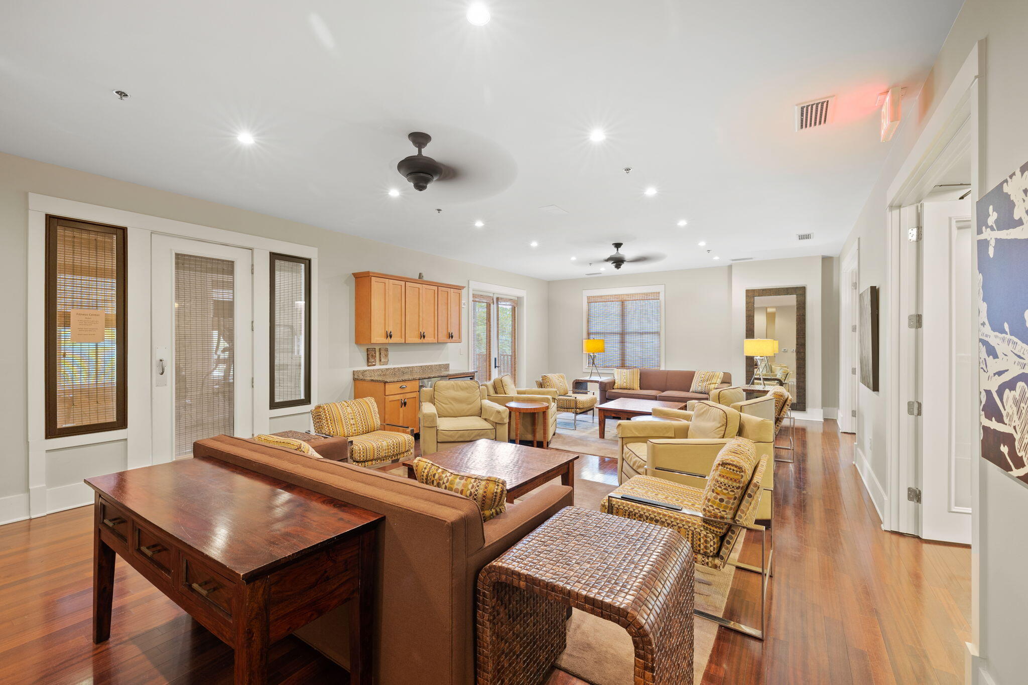 2046 West County Highway 30A, Unit M2230 Santa Rosa Beach, FL 32459 - Photo 37 of 39 a living room with fireplace furniture and a table