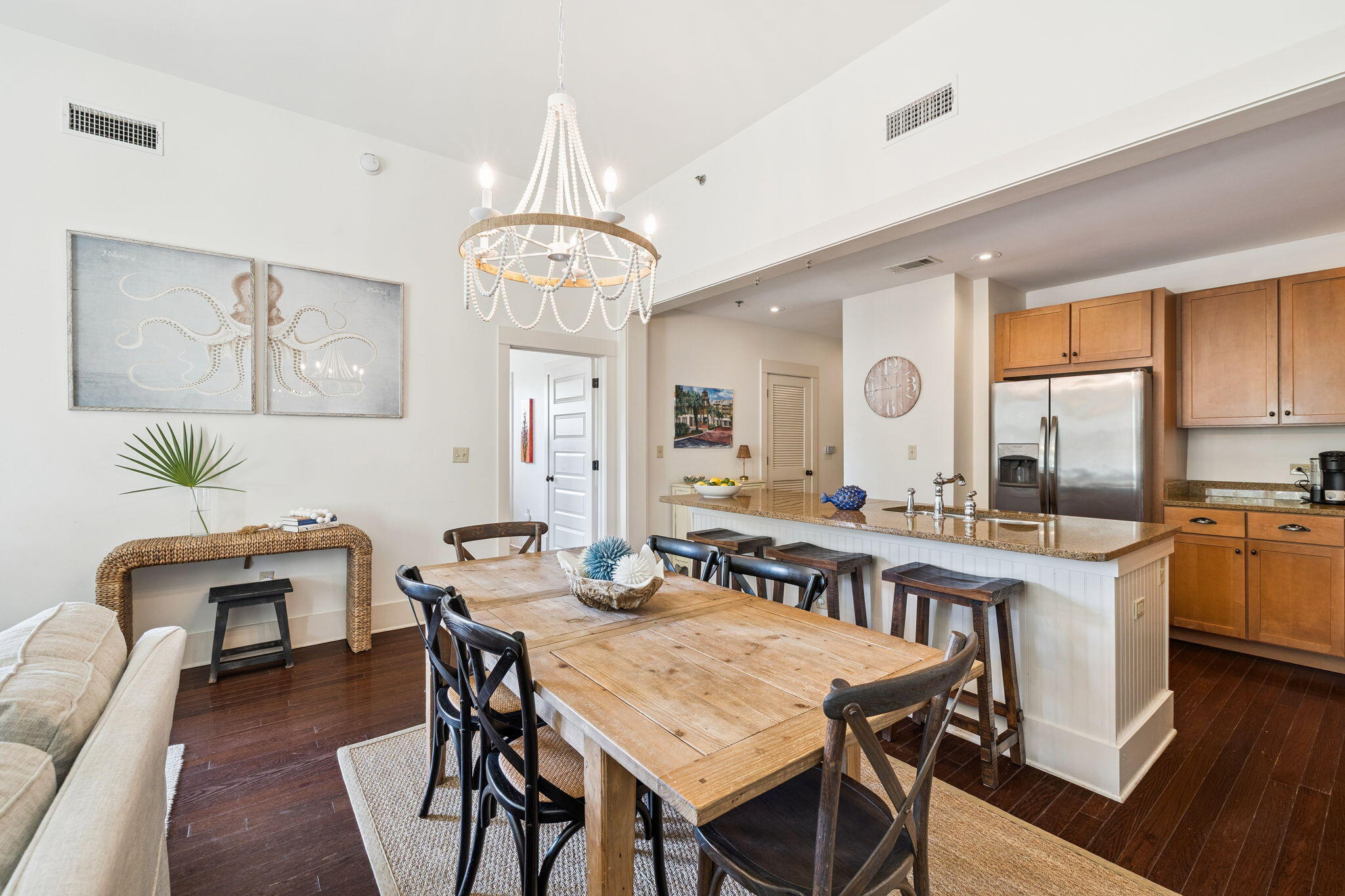 2046 West County Highway 30A, Unit M2230 Santa Rosa Beach, FL 32459 - Photo 7 of 39 a view of a dining room with furniture window and wooden floor