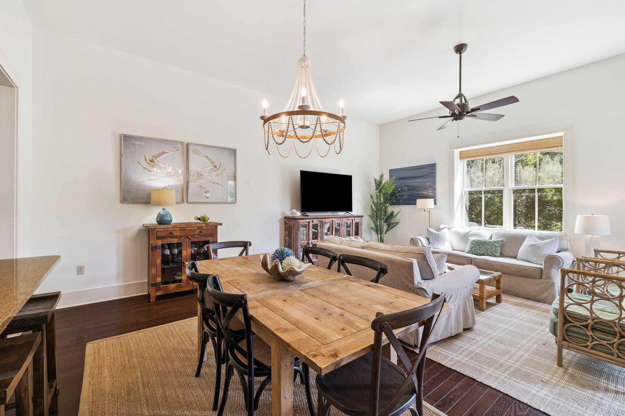 2046 West County Highway 30A, Unit M2230 Santa Rosa Beach, FL 32459 - Photo 8 of 39 a view of a dining room with furniture window and wooden floor