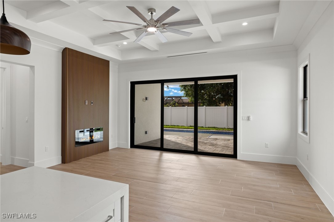 548 109th Avenue North Naples, FL 34108 - Photo 6 of 37 wooden floor in an empty room
