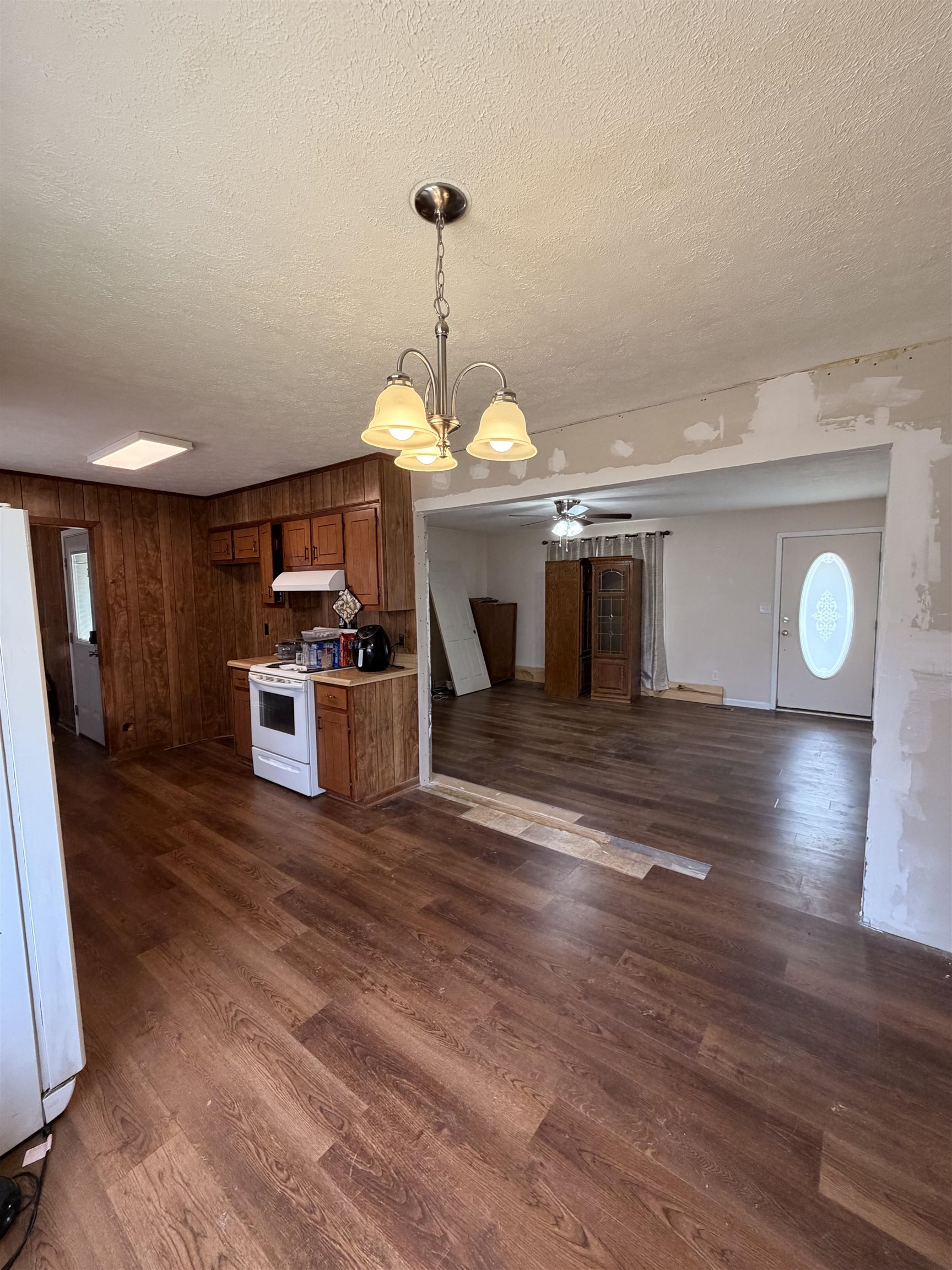 322 Robin Drive Ripley, TN 38063 - Photo 3 of 8 a view of kitchen with microwave and wooden floor
