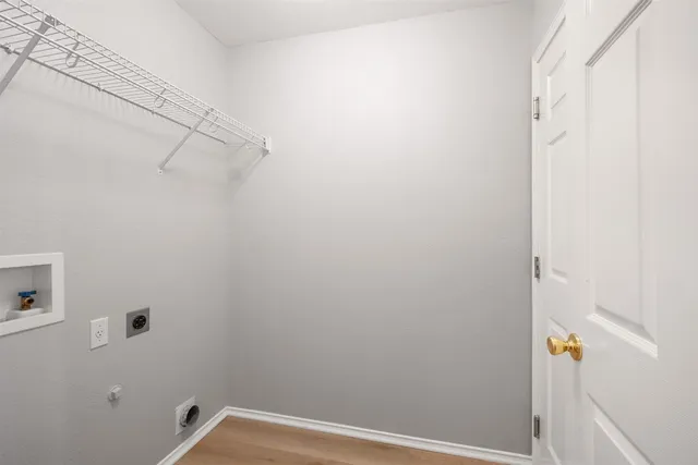 a view of a room with racks on the wall