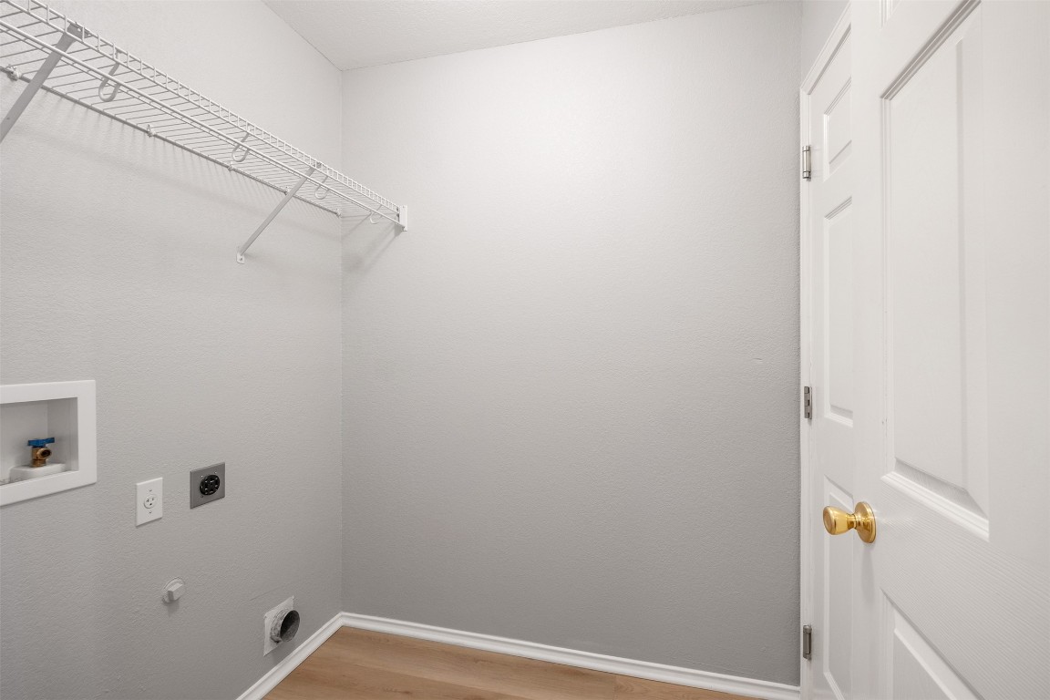 2006 Charlotte Way Round Rock, TX 78664 - Photo 13 of 24 a view of a room with racks on the wall