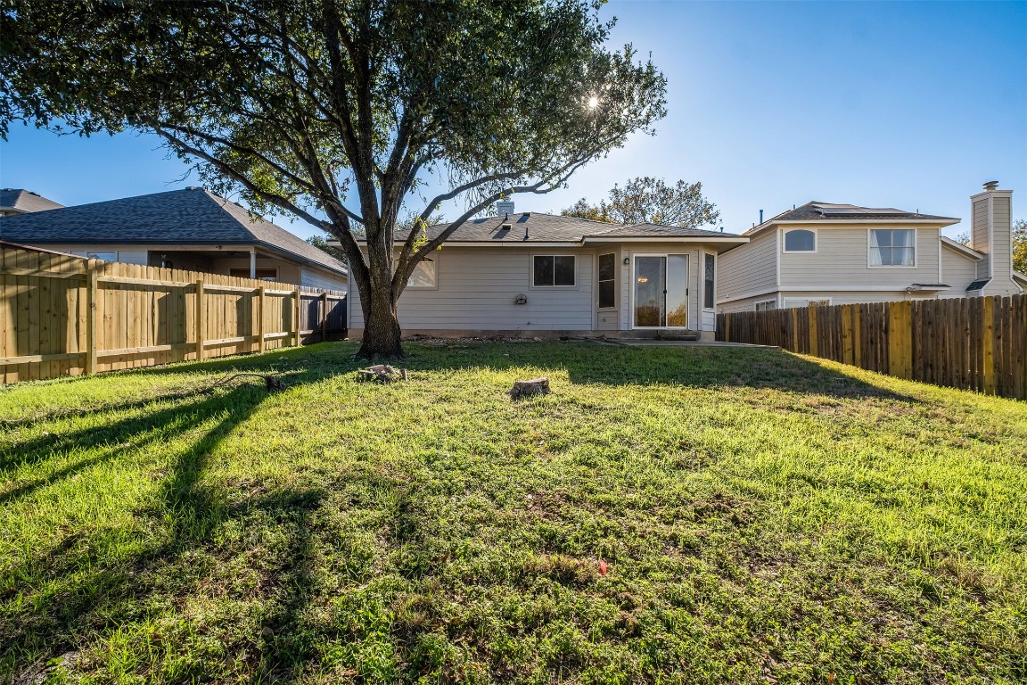2006 Charlotte Way Round Rock, TX 78664 - Photo 20 of 24 a front view of a house with garden