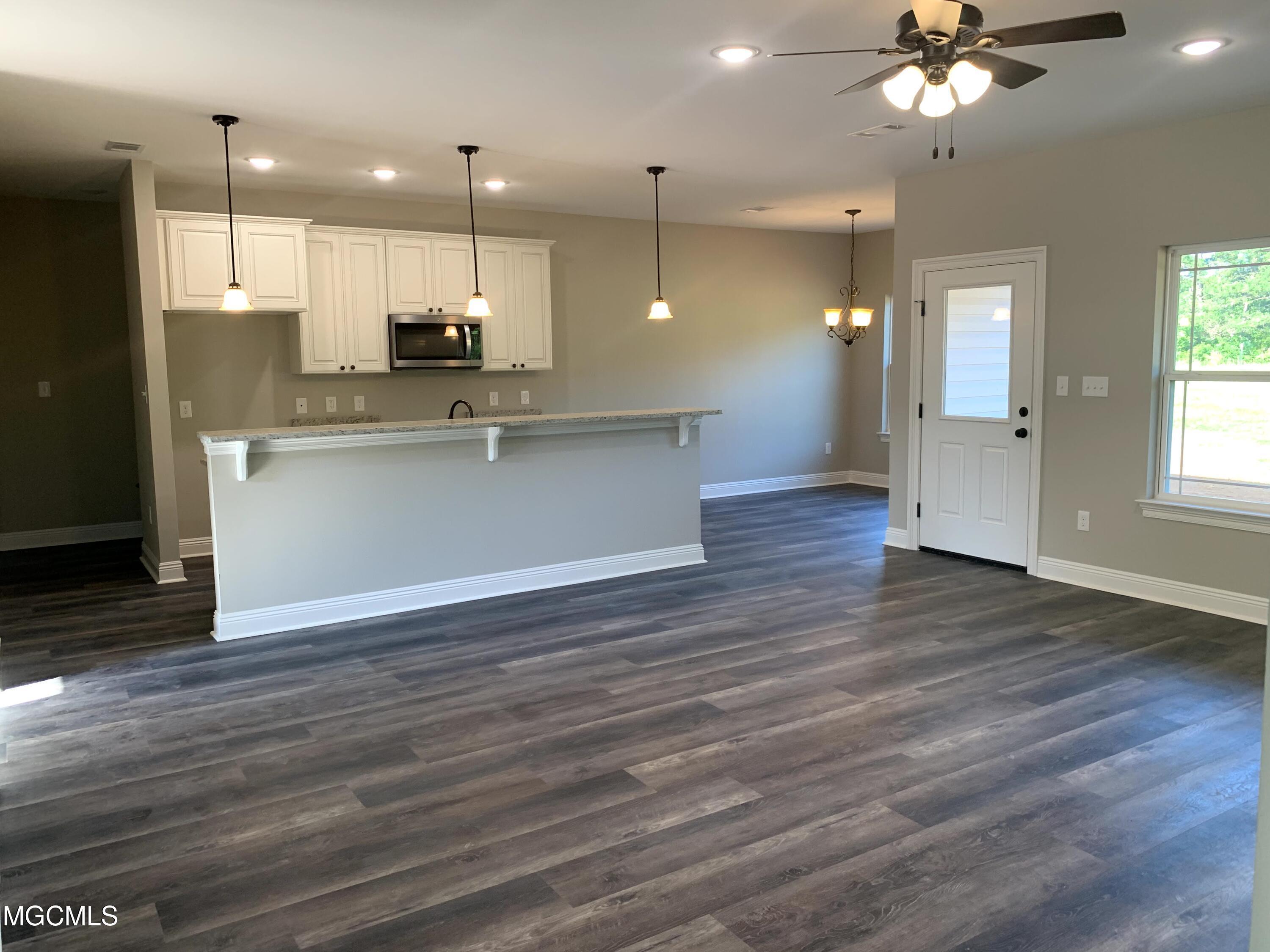 17025 Old Joe Moran Road Kiln, MS 39556 - Photo 3 of 27 Living room to kitchen