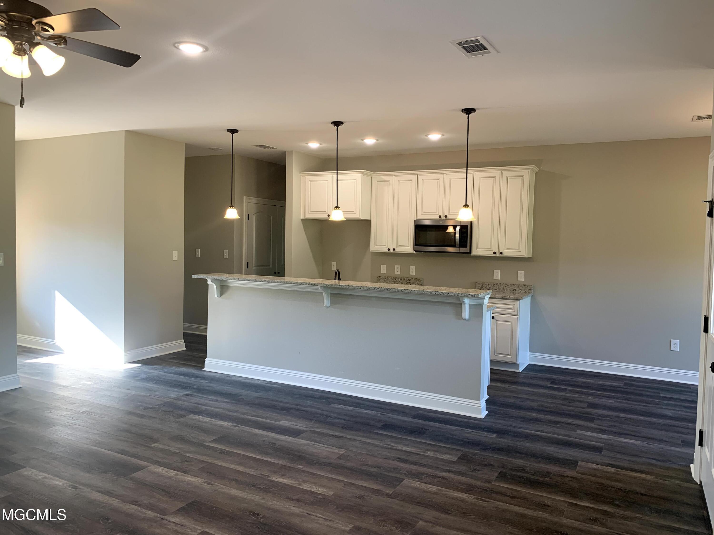 17025 Old Joe Moran Road Kiln, MS 39556 - Photo 8 of 27 Living room to kitchen