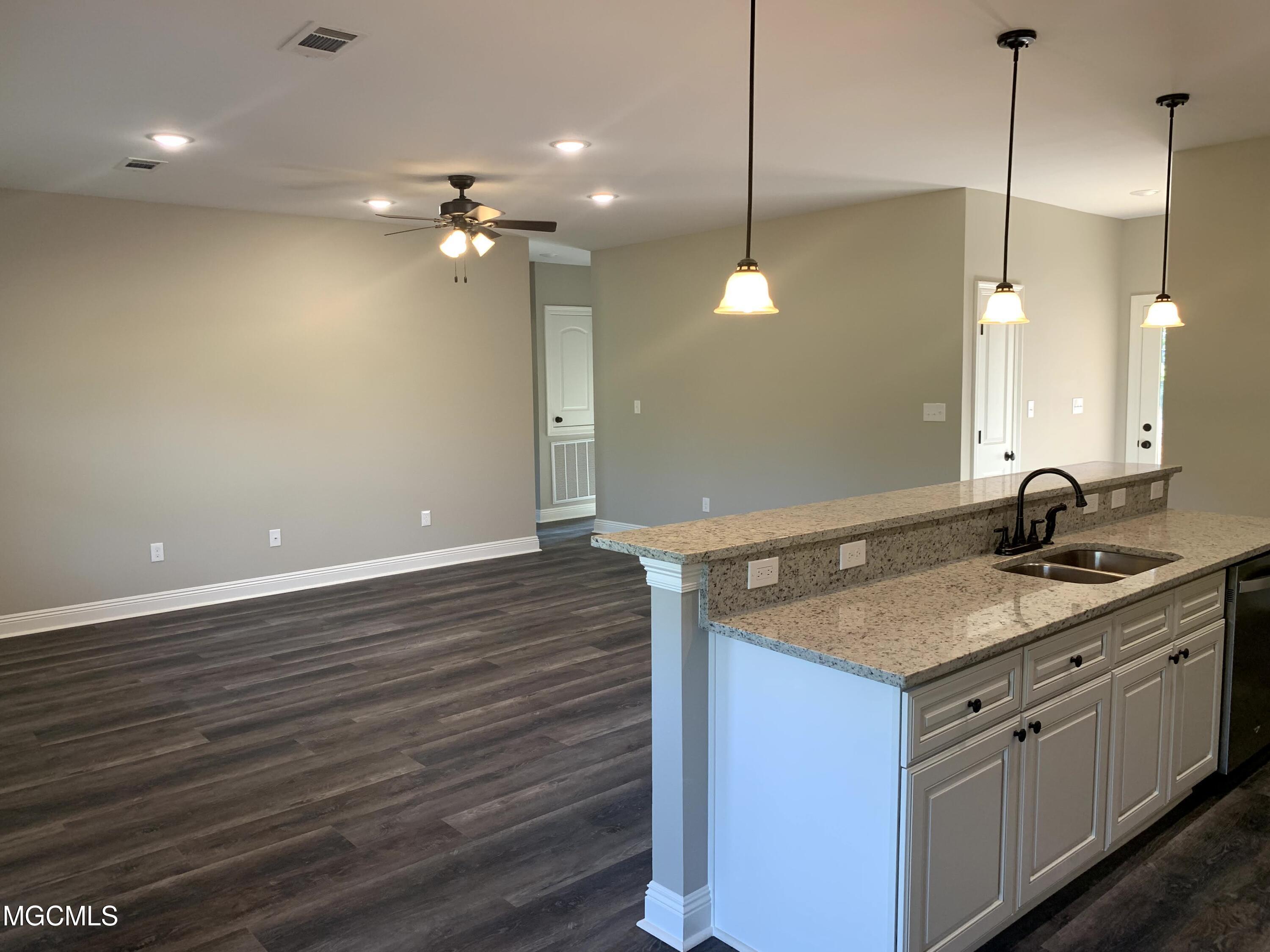 17025 Old Joe Moran Road Kiln, MS 39556 - Photo 9 of 27 Kitchen to living room
