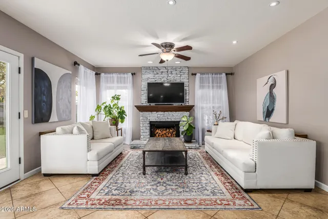 a kitchen with stainless steel appliances granite countertop a stove top oven a sink a counter top space and cabinets