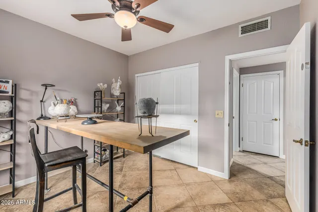 a bathroom with a granite countertop sink mirror and shower