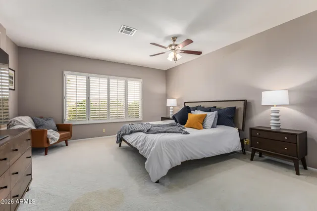 a view of a livingroom with wooden floor and closet