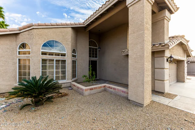 a view of entryway livingroom and hall with wooden floor
