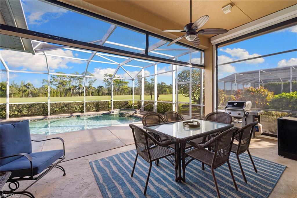 1845 Pondside Lane Naples, FL 34109 - Photo 37 of 47 a view of a dining room with furniture window and outside view