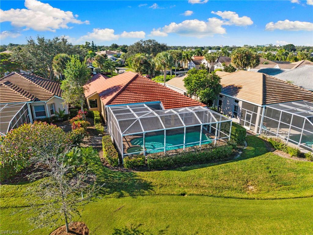 1845 Pondside Lane Naples, FL 34109 - Photo 44 of 47 a view of a garden
