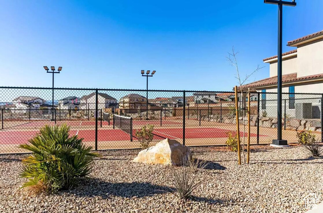 1329 Paseos Street Washington, UT 84780 - Photo 27 of 35 View of tennis court featuring a residential view