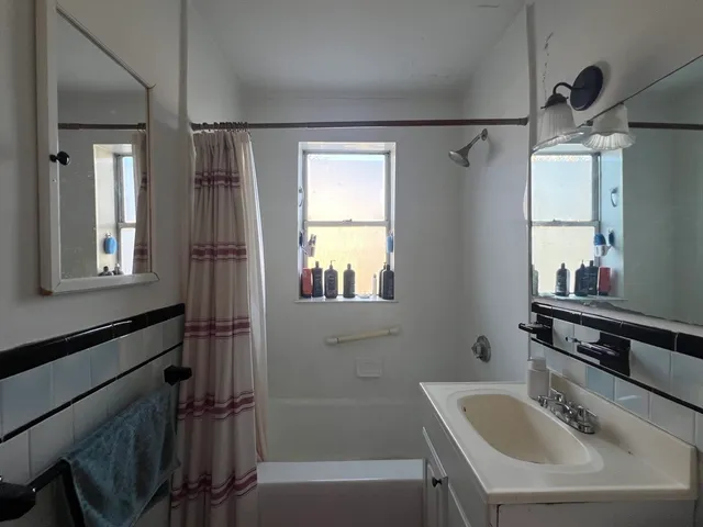 a bathroom with a sink and a bathtub