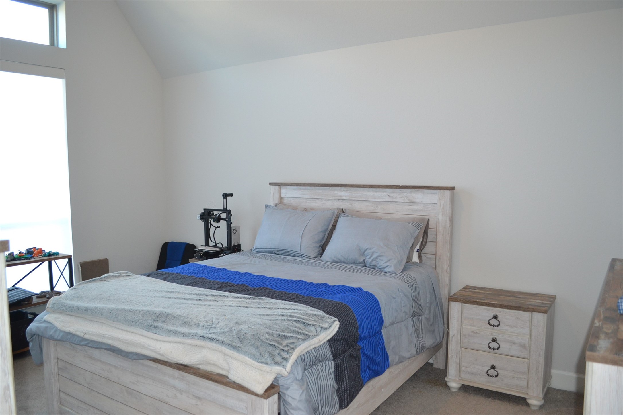 15460 Ringbill Way Magnolia, TX 77354 - Photo 32 of 50 a bedroom with a bed and a tv