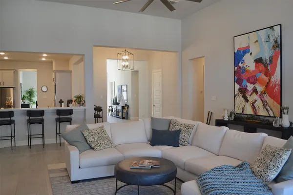 a kitchen with stainless steel appliances a sink cabinets and a refrigerator