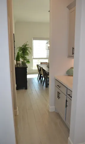 a kitchen with a sink a stove and refrigerator
