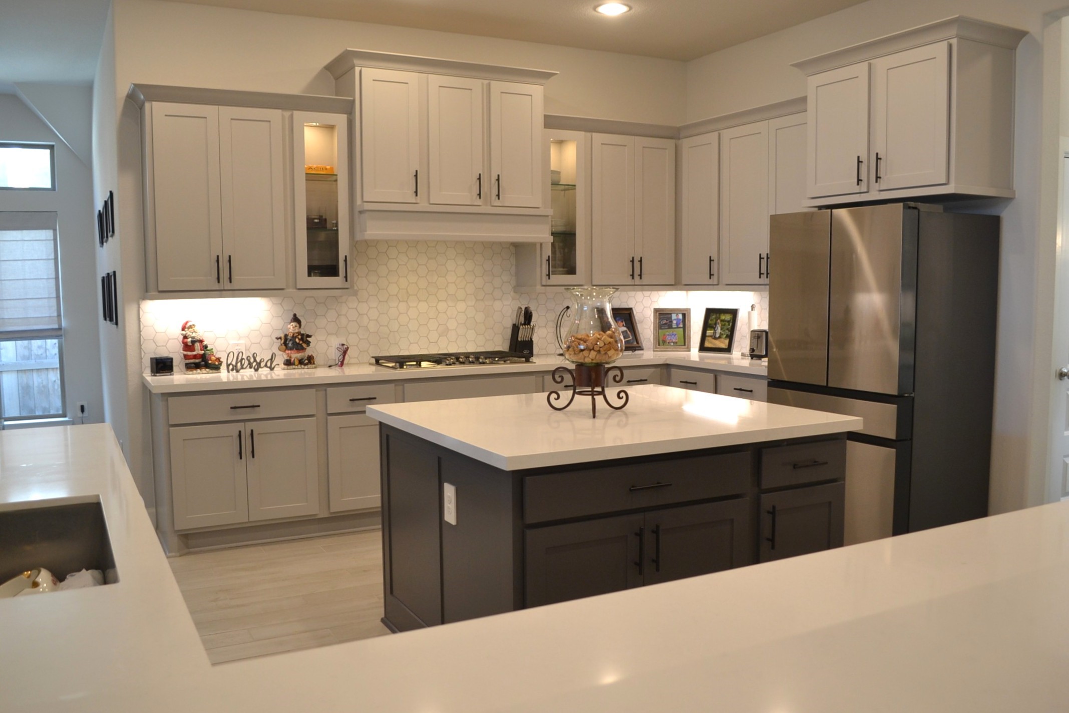 15460 Ringbill Way Magnolia, TX 77354 - Photo 37 of 50 a kitchen with a sink a stove and refrigerator