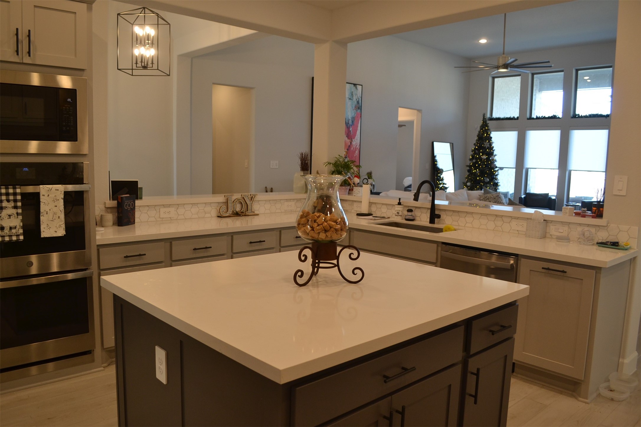 15460 Ringbill Way Magnolia, TX 77354 - Photo 42 of 50 a kitchen with a sink a counter space and stainless steel appliances