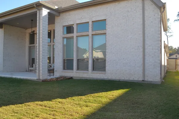 a view of a back yard of the house