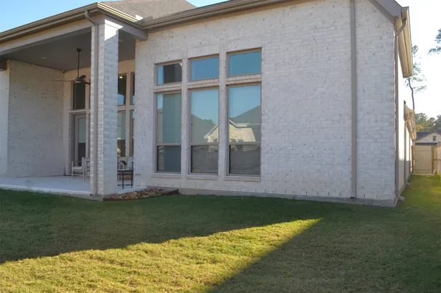 a view of a back yard of the house