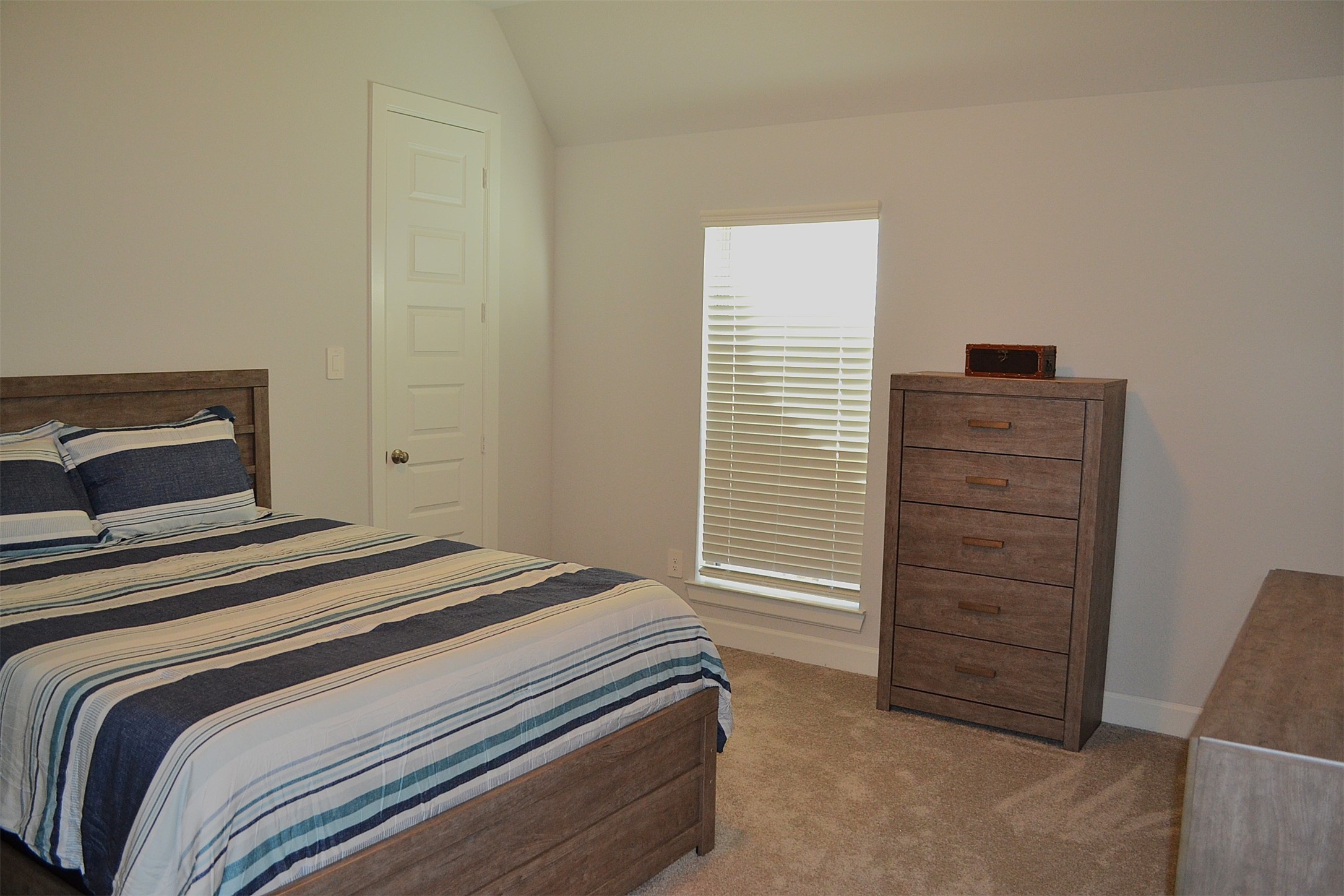 15460 Ringbill Way Magnolia, TX 77354 - Photo 49 of 50 a bedroom with a bed and a window