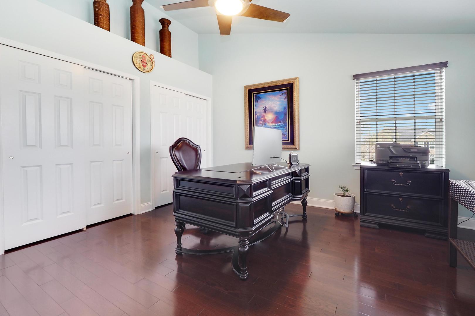 1266 Falcon Ridge Drive Elgin, IL 60124 - Photo 18 of 28 a living room with furniture and wooden floor