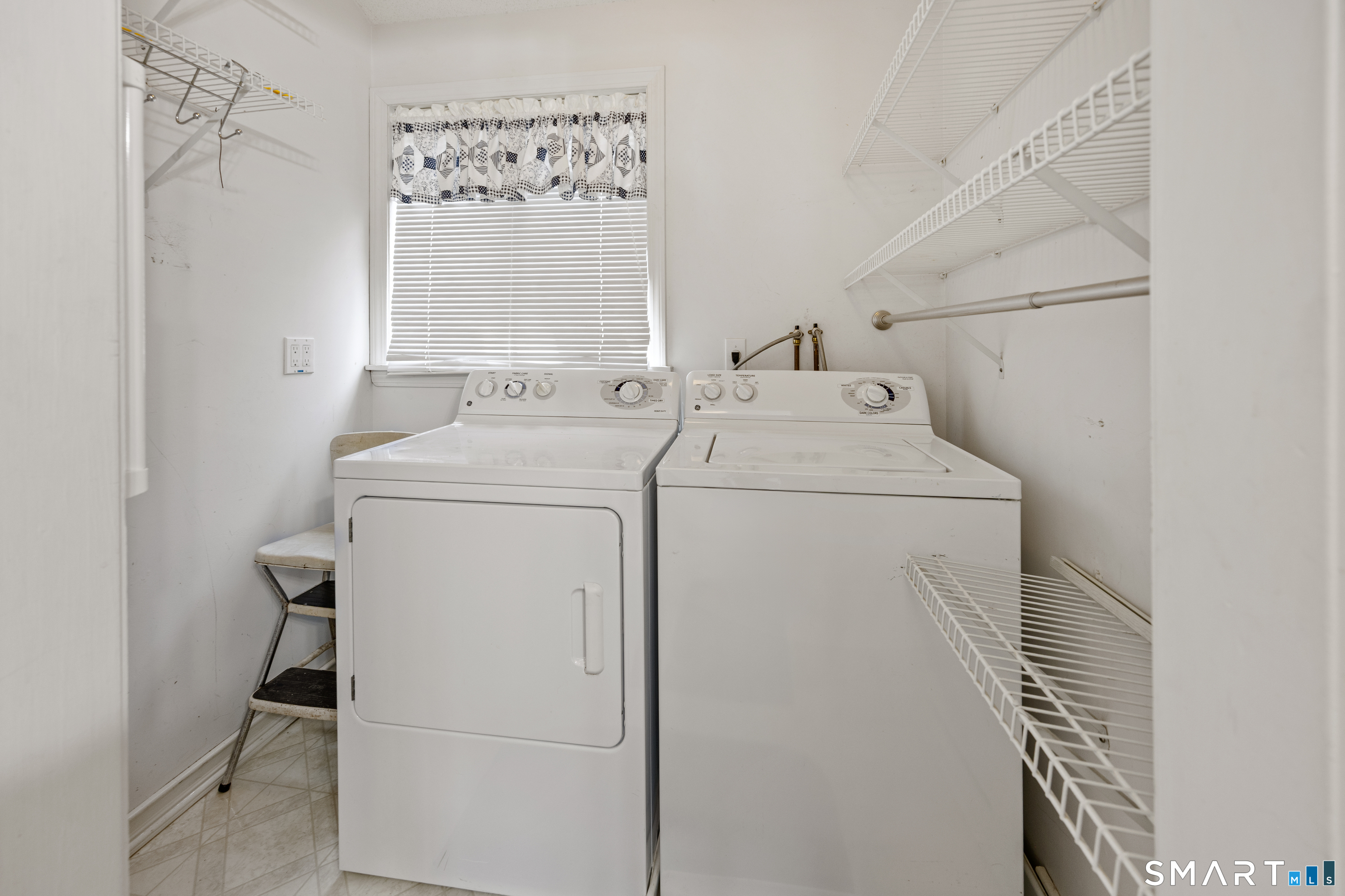 42 Chimney Sweep Road Wallingford, CT 06492 - Photo 36 of 40 a utility room with dryer and washer