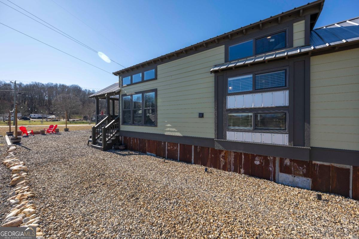 192 Mountain Road Morganton, GA 30560 - Photo 2 of 42 a view of car parked in front of house
