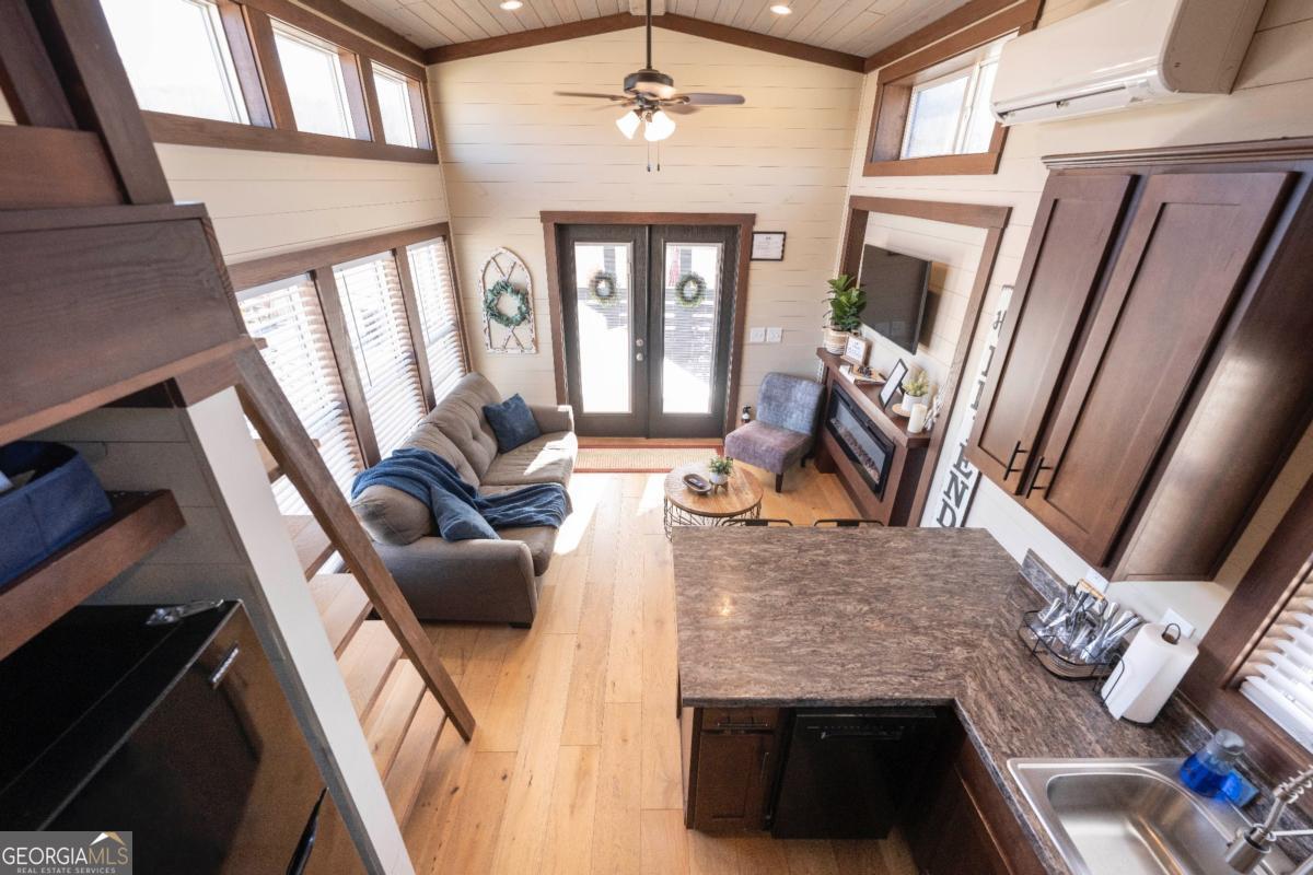 192 Mountain Road Morganton, GA 30560 - Photo 21 of 42 a living room with furniture and a fireplace