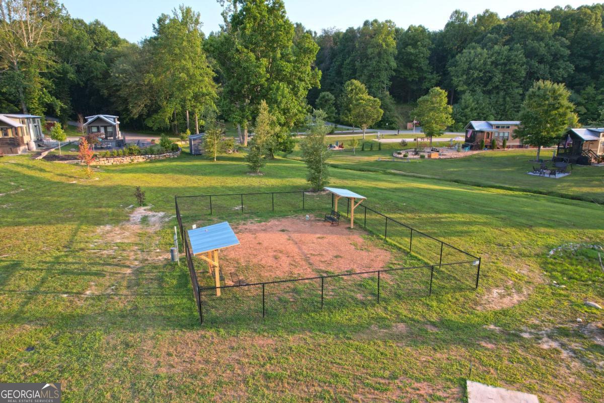 192 Mountain Road Morganton, GA 30560 - Photo 37 of 42 a view of a golf course with a lake