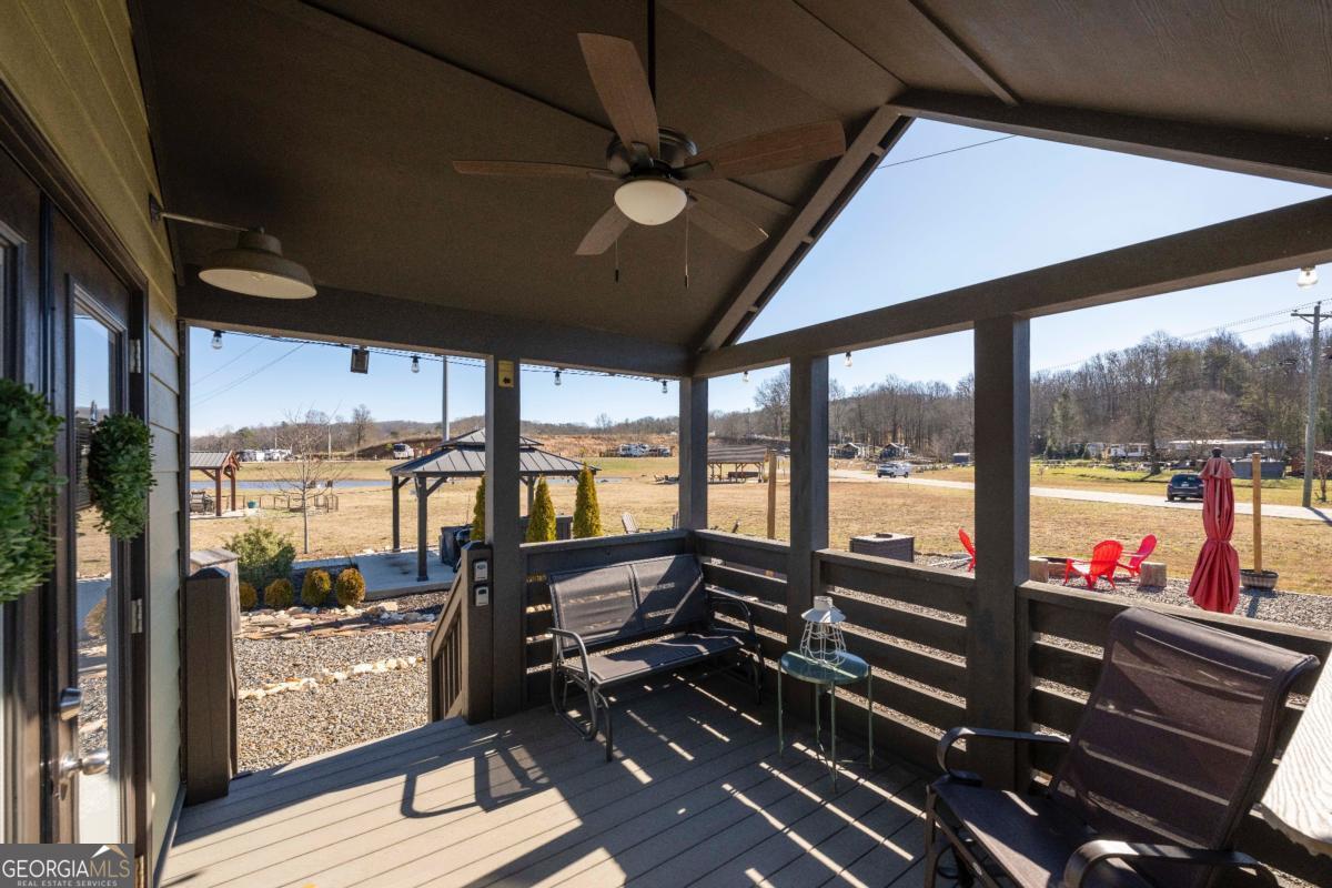 192 Mountain Road Morganton, GA 30560 - Photo 5 of 42 a living room with large windows