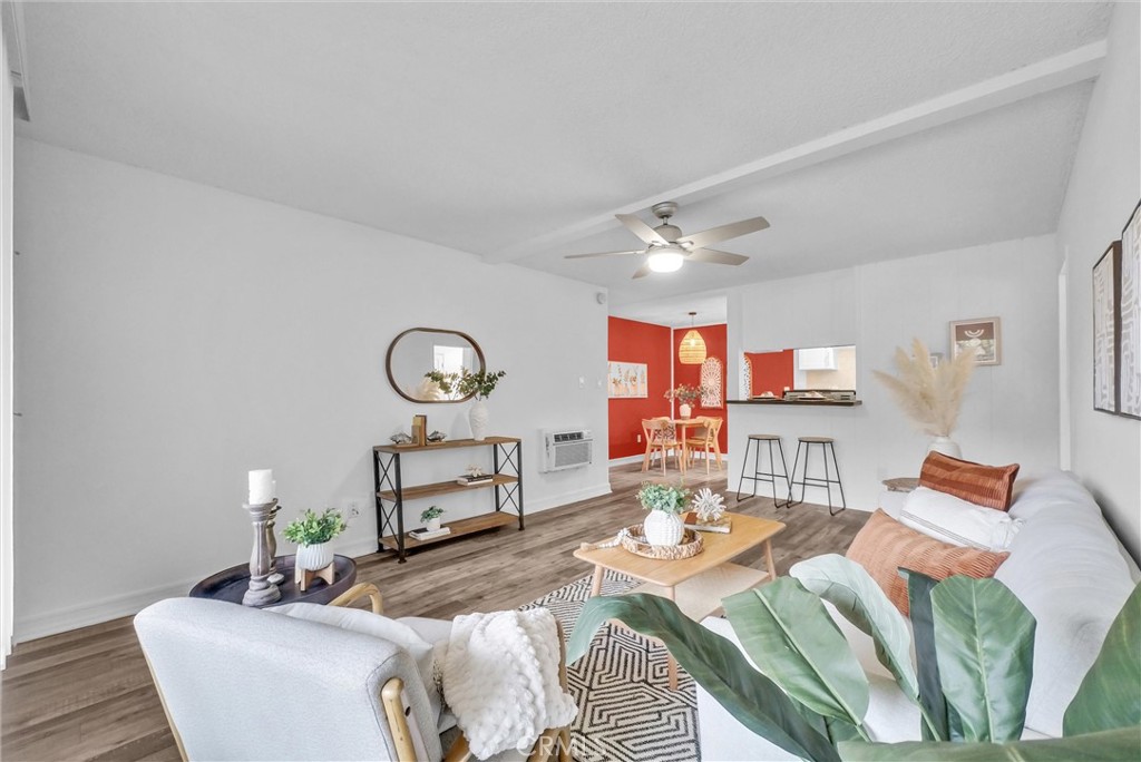 1030 West MacArthur Boulevard, Unit 5 Santa Ana, CA 92707 - Photo 1 of 26 a living room with furniture