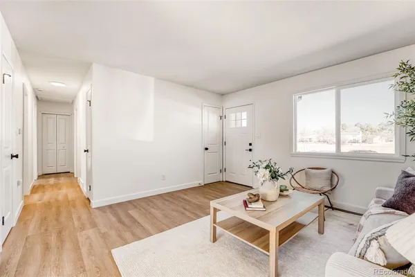 a living room with furniture and window