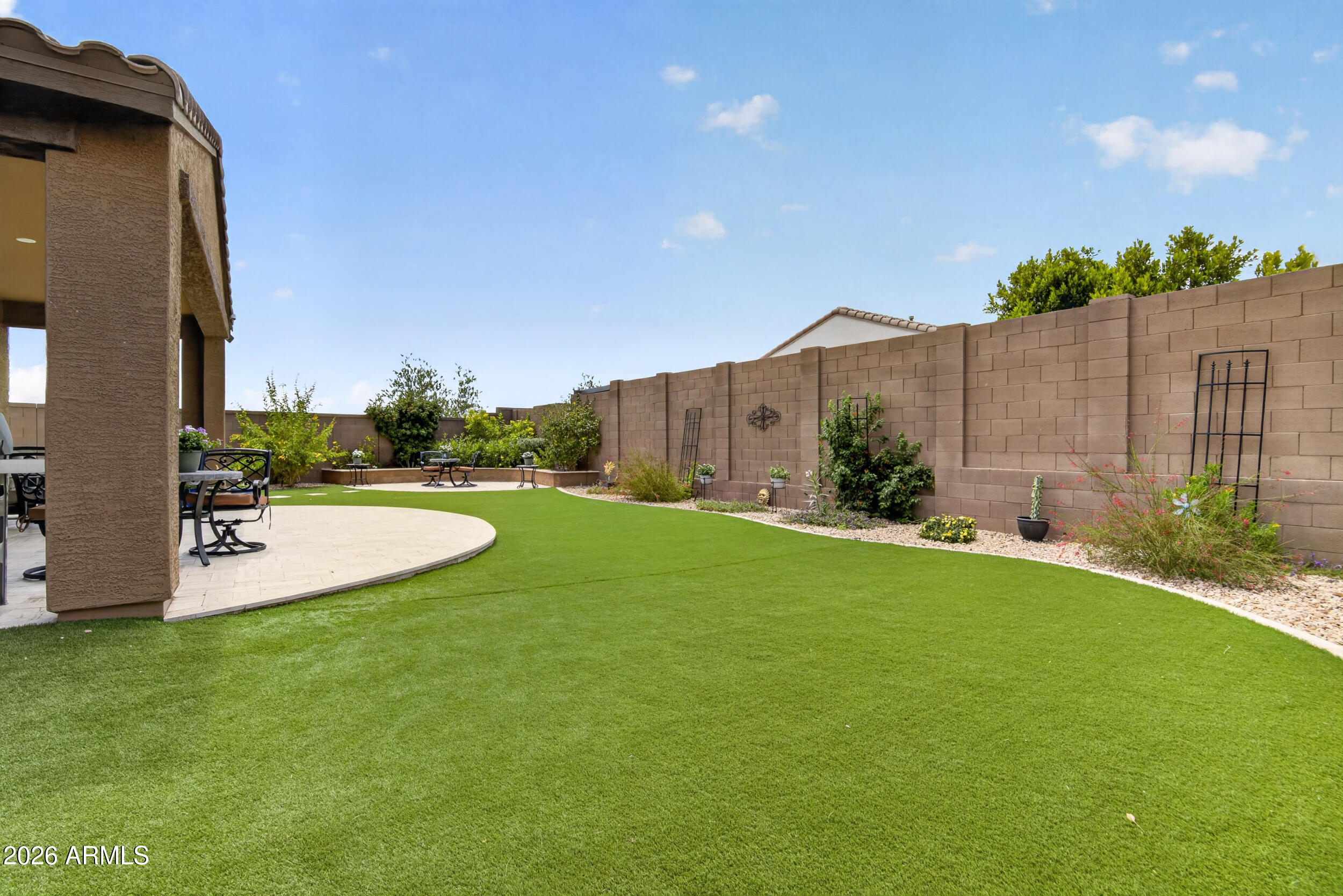 12330 East Soloman Road Gold Canyon, AZ 85118 - Photo 51 of 69 a view of a garden with a house