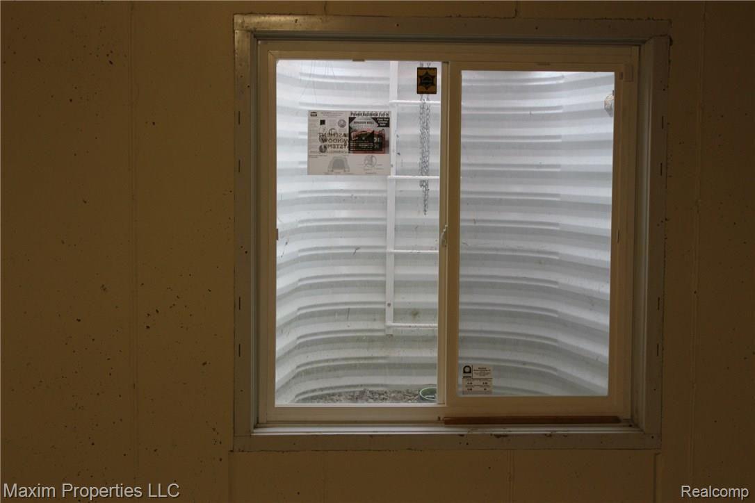 20497 Coachwood Road Riverview, MI 48193 - Photo 21 of 24 BSMT EGRESS DOOR.JPG