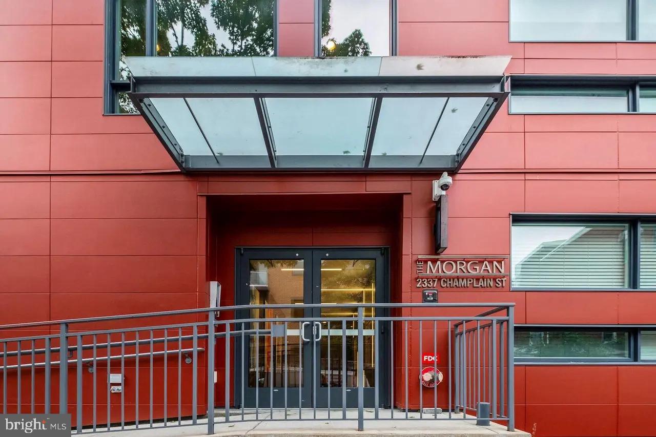 2337 Champlain Street Northwest, Unit 104 Washington, DC 20009 - Photo 17 of 29 a view of a brick house with a window