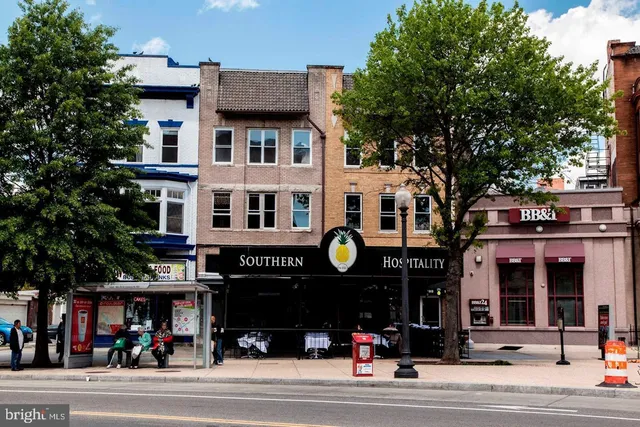 a view of a building and a street