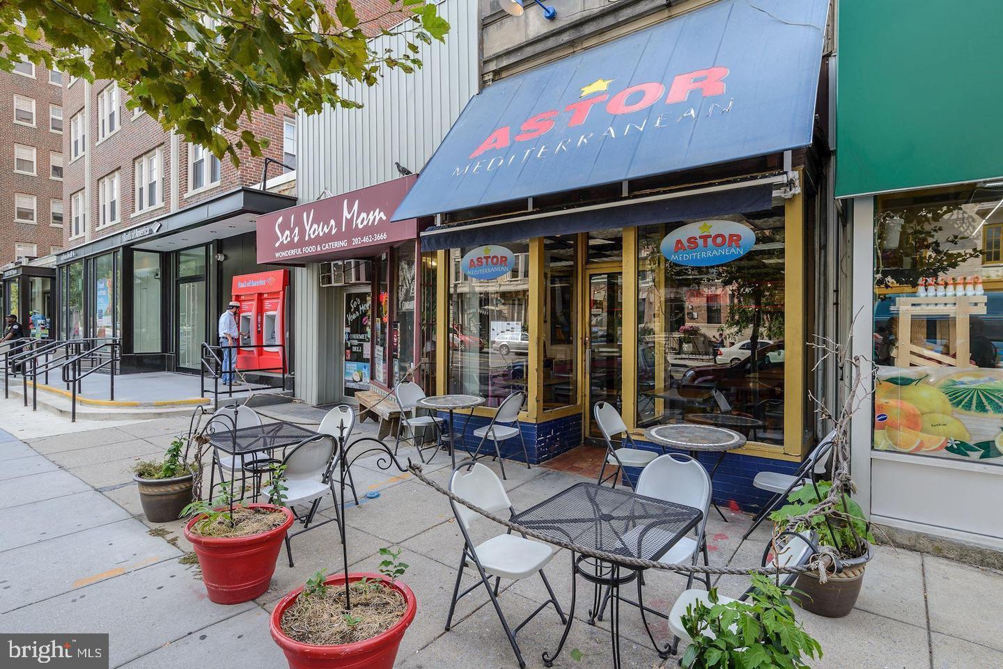 2337 Champlain Street Northwest, Unit 104 Washington, DC 20009 - Photo 28 of 29 a view of a cafe with a table and chairs