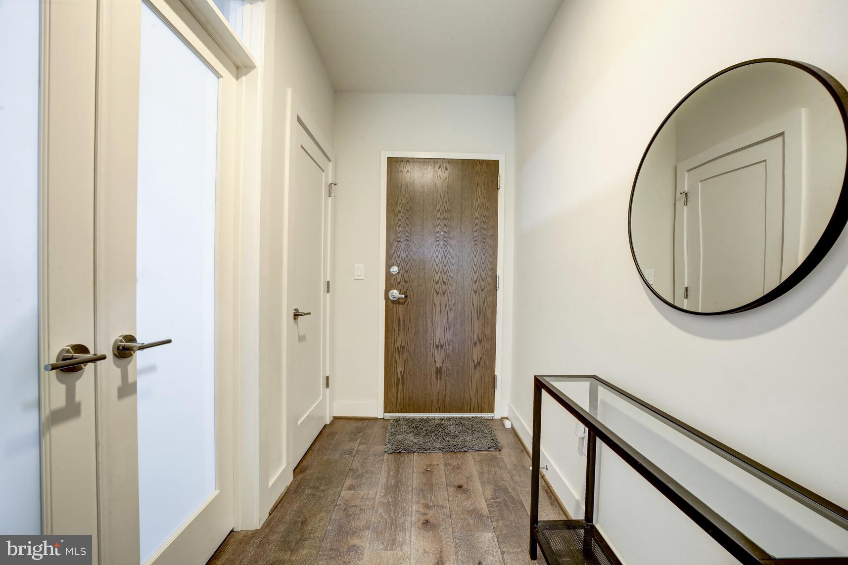 2337 Champlain Street Northwest, Unit 104 Washington, DC 20009 - Photo 3 of 29 a view of a livingroom from a bathroom