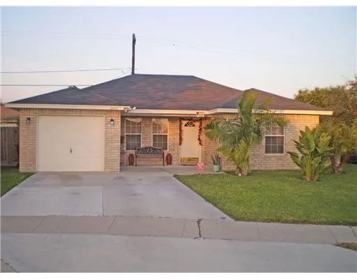 a house view with a garden space