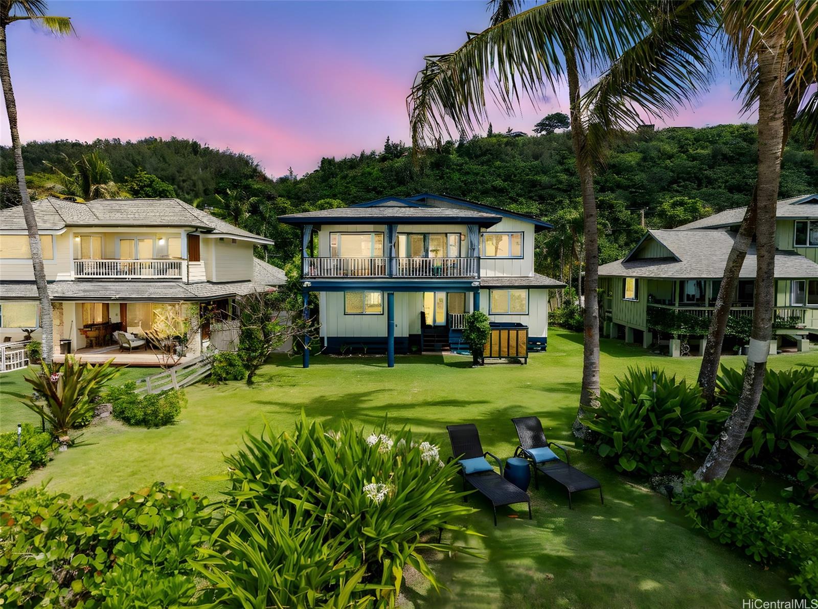 59-535 Ke Iki Road, Unit A Haleiwa, HI 96712 - Photo 24 of 25 a front view of a house with a yard table and chairs