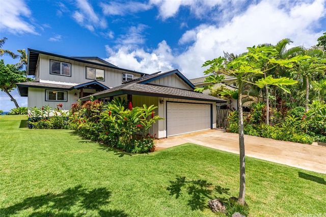 a house view with a garden space