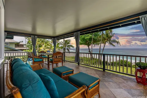 a kitchen with stainless steel appliances granite countertop a refrigerator a sink dishwasher and wooden cabinets with wooden floor